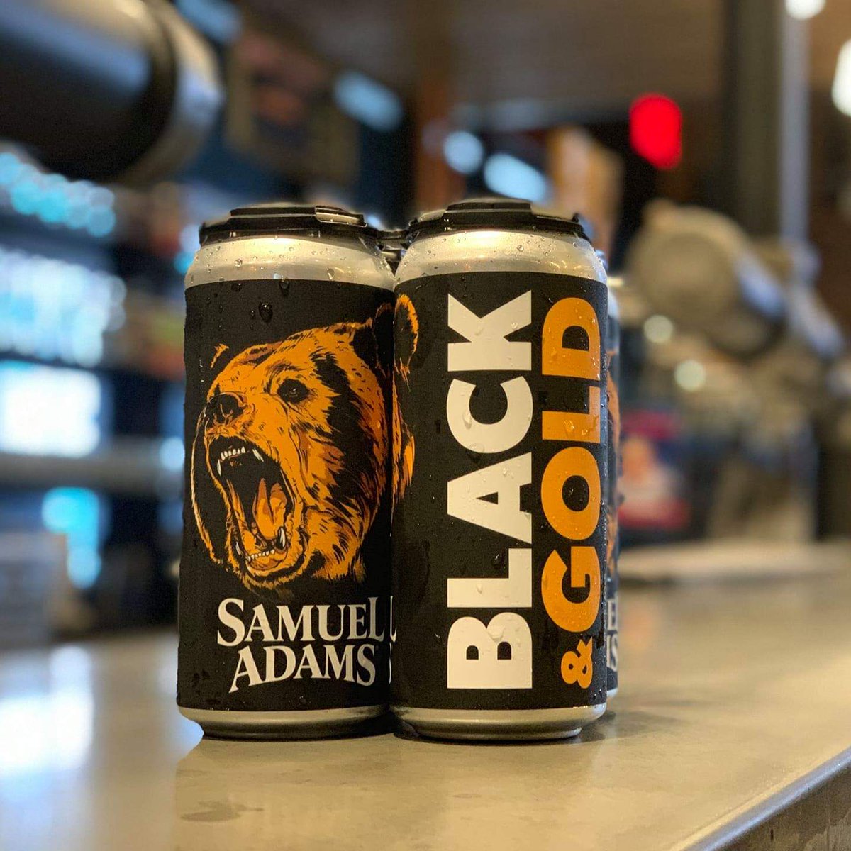 BostonAttitude's tweet photo. Game Day Beer Alert!! 
Today, @SamuelAdamsBeer is selling a limited-release Black &amp; Gold beer !! 

It's a Bavarian-inspired black lager that comes in a 4-pack, 16 oz. cans.

Sale starts at 3pm only at the Boston brewery.   

Just in time to cheer on the #NHLBruins for game 4!! https://t.co/H4xCID8OgC