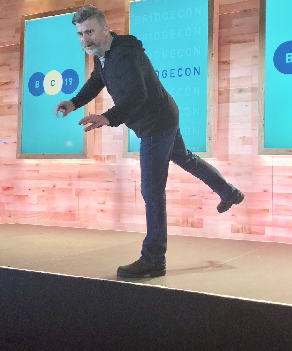 HMErickson's tweet photo. @Instructure SVP of Product, Mitch Benson, represents the closest he’ll get to an edge of a cliff. @AlexHonnold you have some competition. #BridgeCon https://t.co/ozdZnqcsMK