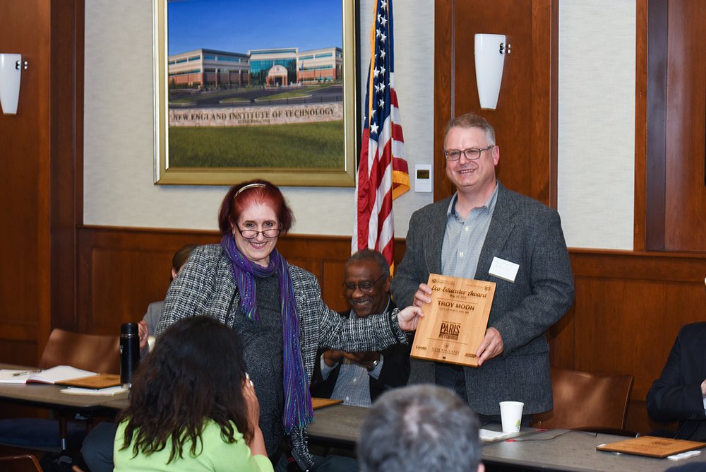 Eco-Educator Award presented to <a href="/TroyInPortland/">Troy Moon 🌘</a> Sustainability Coord <a href="/CityPortland/">City of Portland, Maine</a> who attended the Comm. Action Event <a href="/NEInstituteTech/">New England Institute of Technology</a> as we tackled #climatechange &amp; presented a screening of #ParistoPittsburgh. Thank you for your GRT WRK! <a href="/PressHerald/">Portland Press Herald</a> <a href="/BosGreenFest/">Boston GreenFest</a> <a href="/NIROPE/">Cardi's Furniture & Mattresses</a>