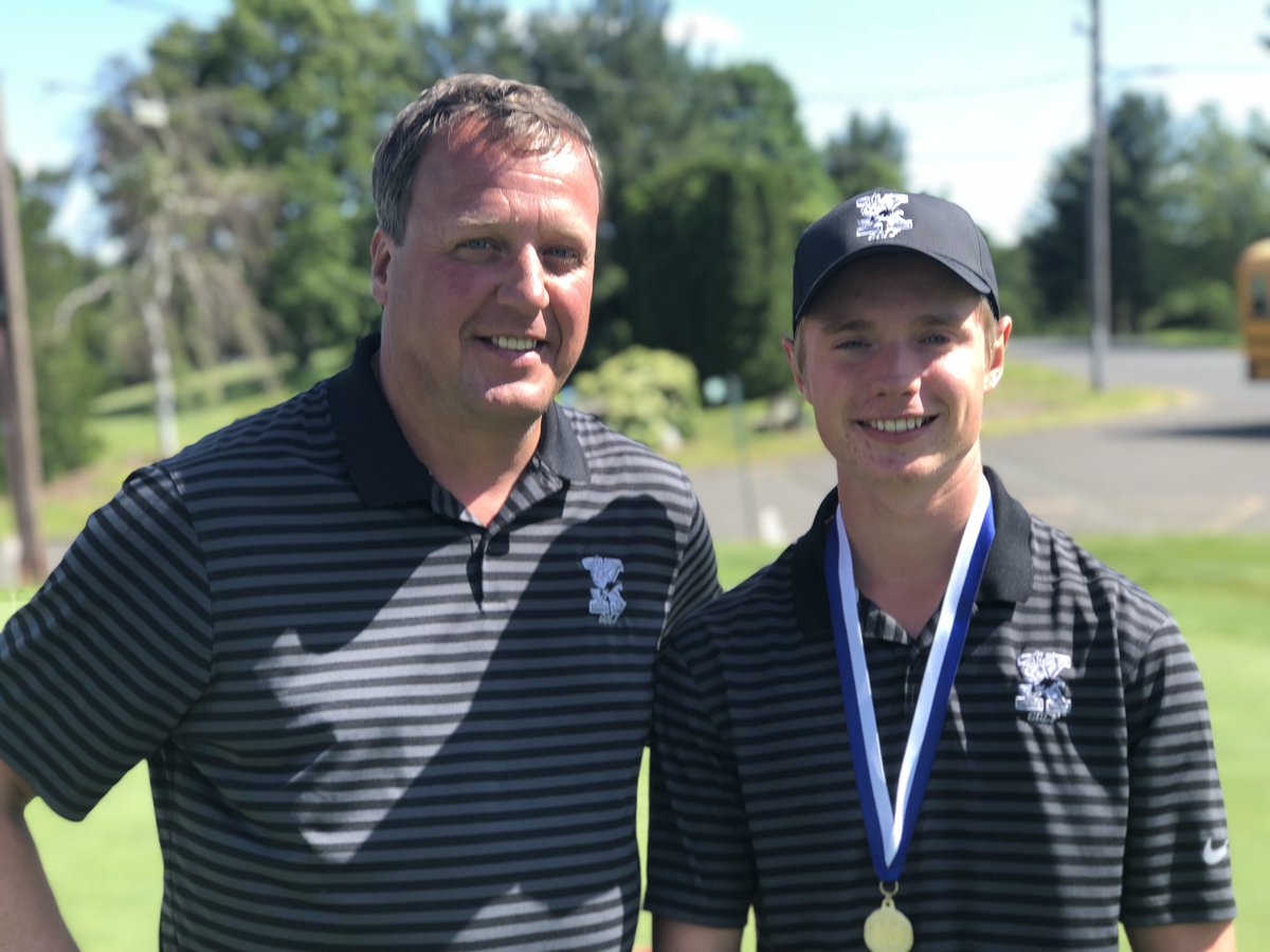Winning the individual title at the Division I Tournament was about the only title that had eluded Chris Fosdick. He got it today with his 70. Fosdick also gets All-State honors. Here he is with Xavier golf coach Mike Kohs. <a href="/XHSGolf/">Xavier HS Golf</a> #ThisIsXavier