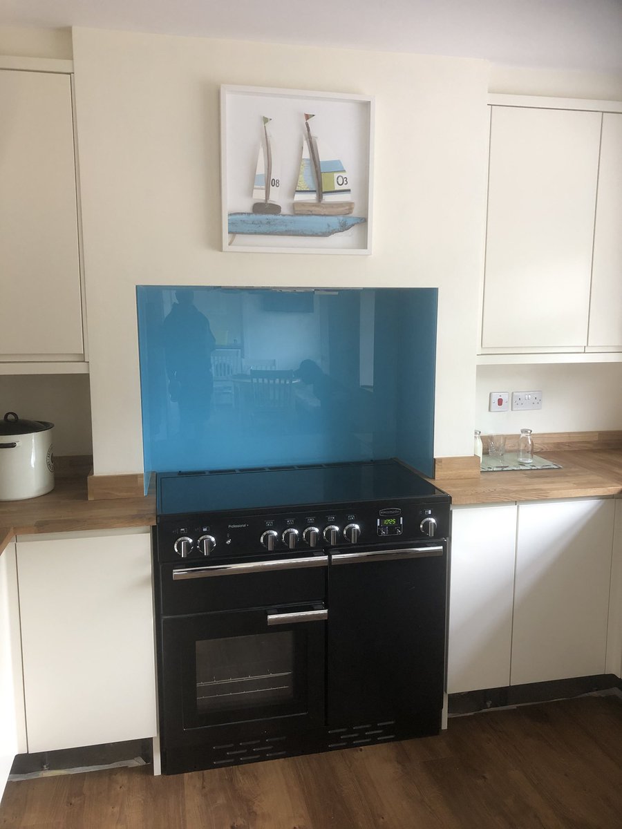 Toughened Safety glass coloured splashbacks we fitted to recess around kitchen stove #Dulux #Glazier #Alnwick