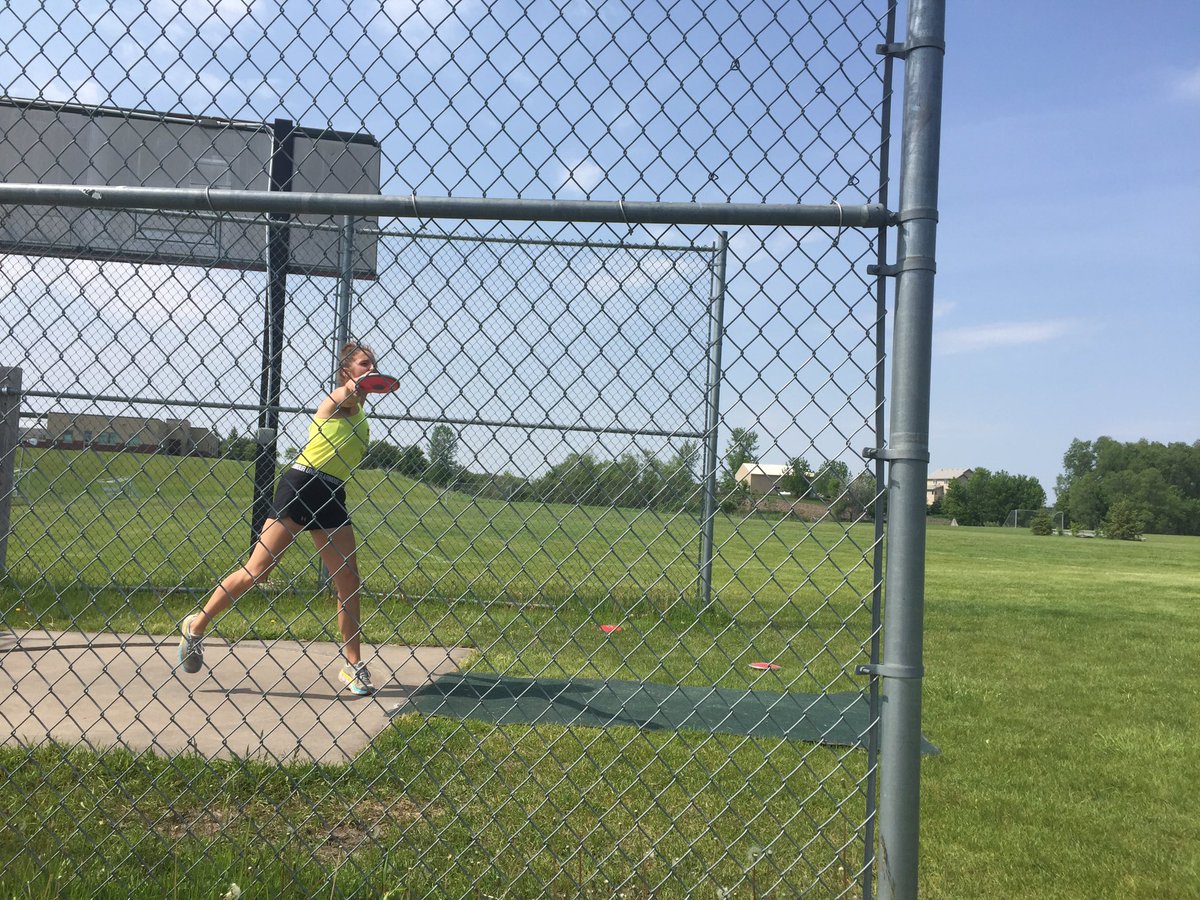 HFTrackField's tweet photo. Had half the coaching staff out today for practice! Coach @meggyb9 learning to throw the Discus π! Keeping things light as we start #StateMeetWeek https://t.co/cUASvE6vT4