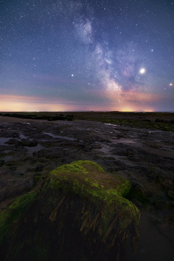 An ancient dinosaur footprint, revealed by the tides, sits under the stars. The light from these stars could well have been shining down on this very dinosaur as it roamed the earth millions of years ago. #SonyAlpha <a href="/iwcponline/">Isle of Wight County Press</a> #pureislandhappiness #Iow