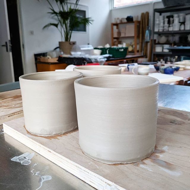 hannah_s_design's tweet photo. Spent the evening at Clay Club, picked up some glazed bits including the mugs I made a few weeks ago.... All except one got stuck to the kiln shelf and the glaze went very strange (see my stories). Managed to throw 4 more mug bodies and a jug though … https://t.co/OYaOV3c0SZ https://t.co/cWNchD7YP0