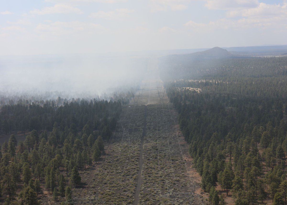 The #MaroonFire is burning next to 2 #transmission lines north of #Flagstaff. Lines are still energized. Good luck to firefighters tonight!