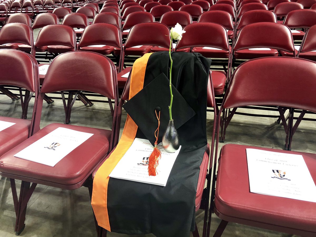 gcschools's tweet image. An empty seat and moment of silence at Southside High School graduation for Udeh Joshua Prince Osuagwu Jr. who lost his life in May.