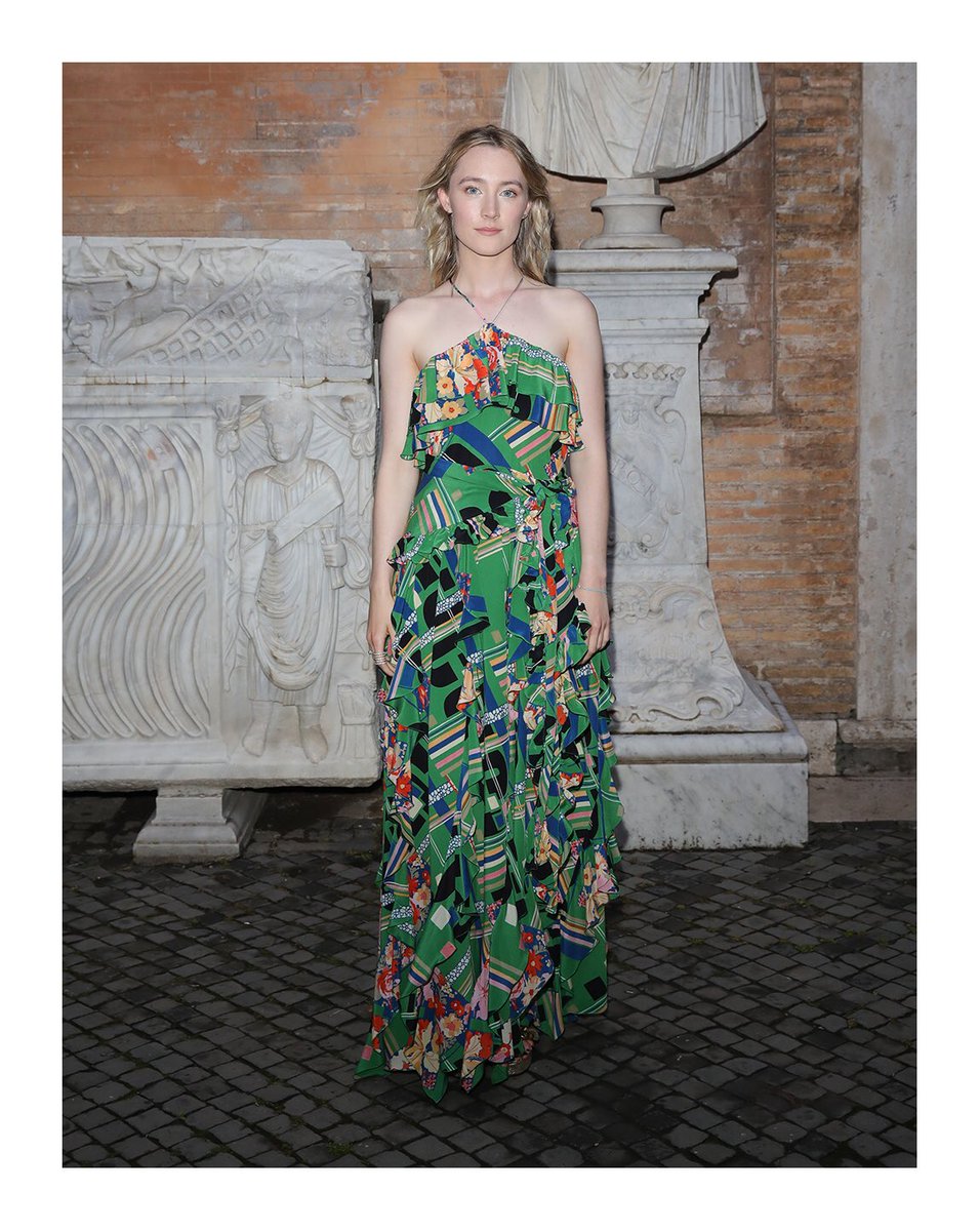 To the #GucciCruise20 fashion show in Rome, #SaoirseRonan wore a printed dress with all-over ruffle details and metallic leather platform sandals from #GucciPreFall19 by #AlessandroMichele. #MuseiCapitolini @museiincomune
