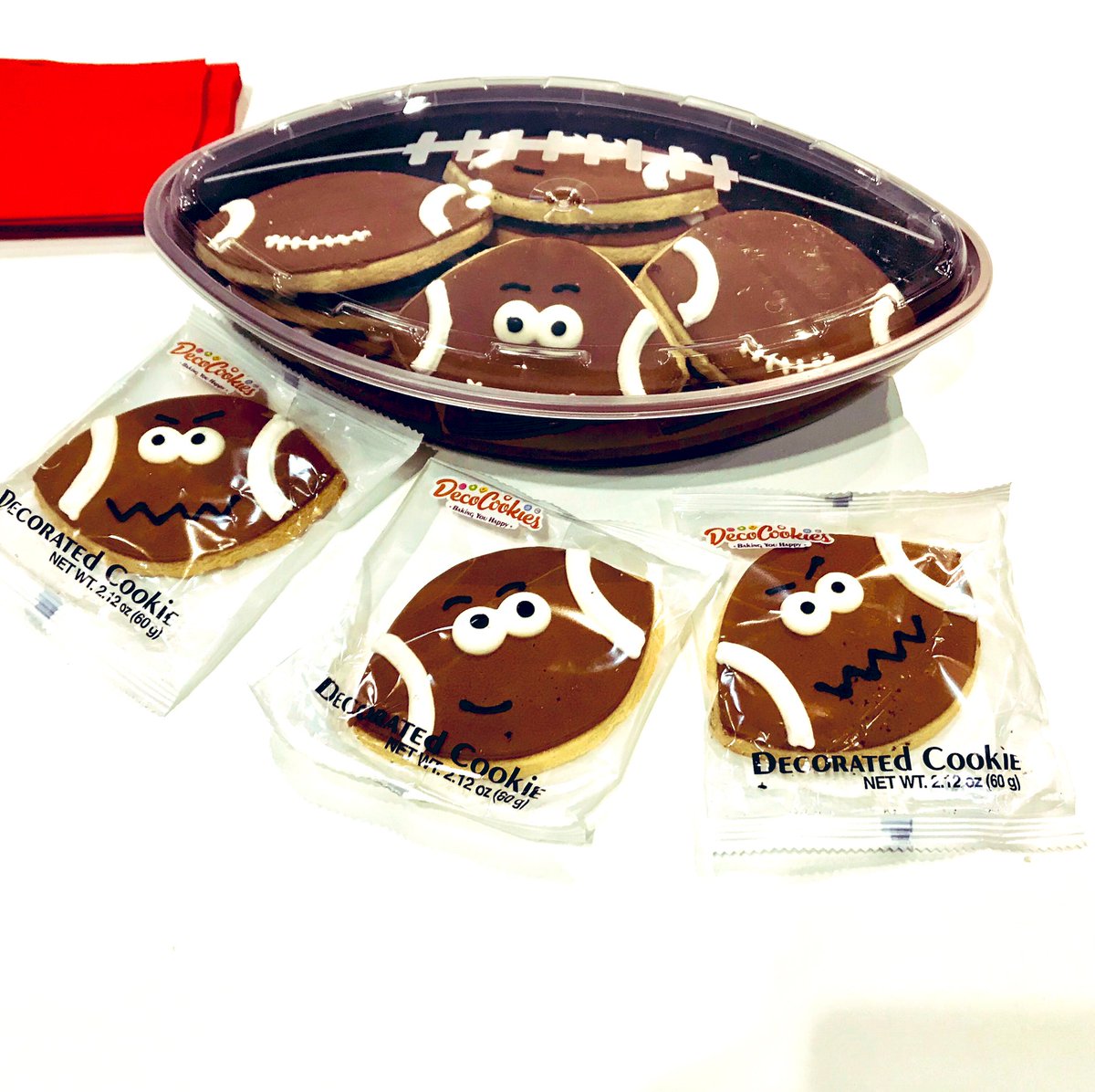 CubePackaging's tweet photo. A match made in #IDDBA19 heaven. The perfect filling for our #footballcontainer Thank you, @decocookies! #bakery #grocery #reusable #foodcontainer #foodbusiness #gameday https://t.co/ekT3mlECa1
