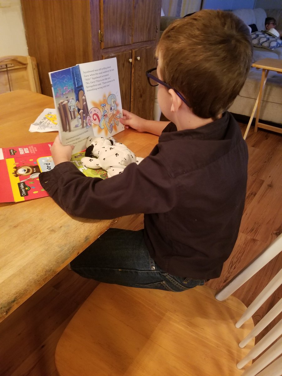 bckkg2007's tweet photo. Reading a book to his stuffed dalmatian!
#NSE19READ https://t.co/A9YHaSHTl6