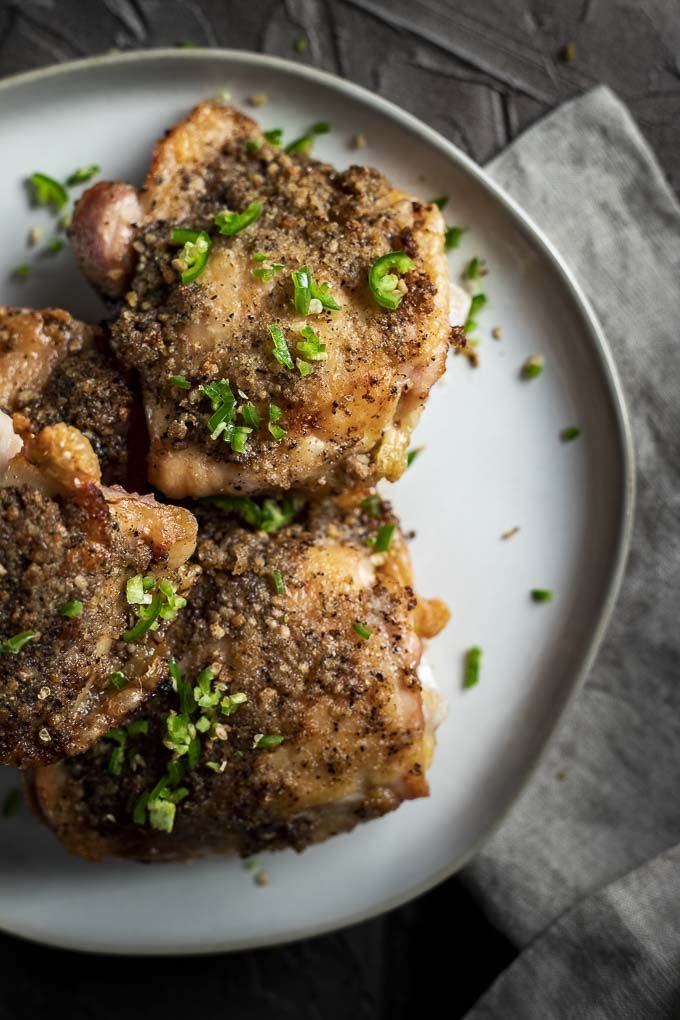 This Salt and Pepper Chicken recipe uses juicy chicken thighs, copious amount of butter (or duck fat), salt and garlic, and 2 different kinds of pepper! #saltandpepperchicken #crispychickenthighs  buff.ly/2Z7ptuw via <a href="/wenthere8this/">Danielle Wolter</a>