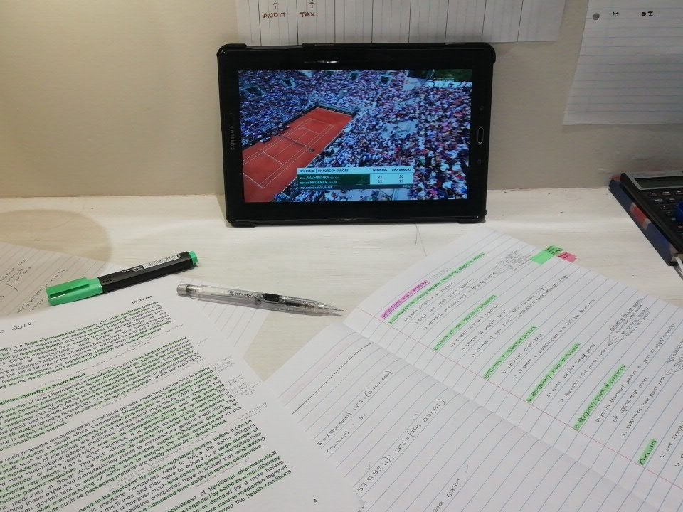 Working hard or hardly working.