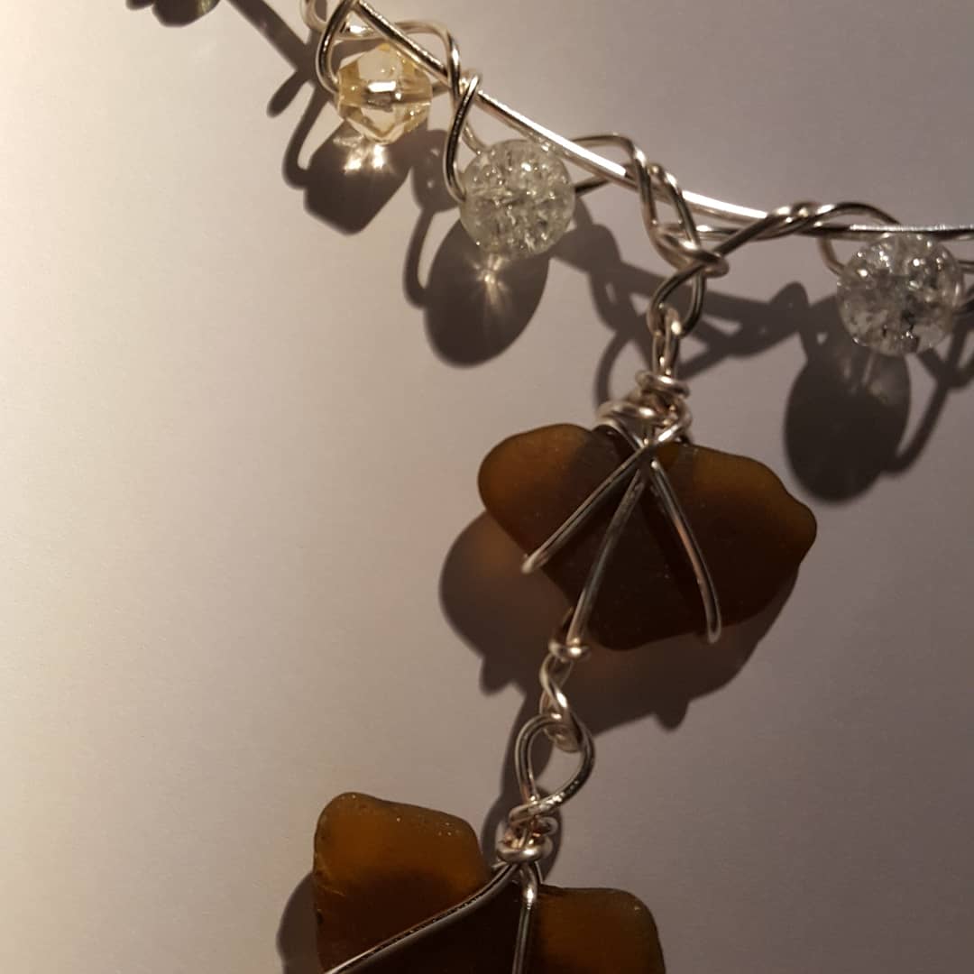newfangled_ed's tweet photo. Wireworked heart shaped Hartlepool sea glass chokers @EntArcStockton #festival #handmadewithlove https://t.co/3pESSATHIO