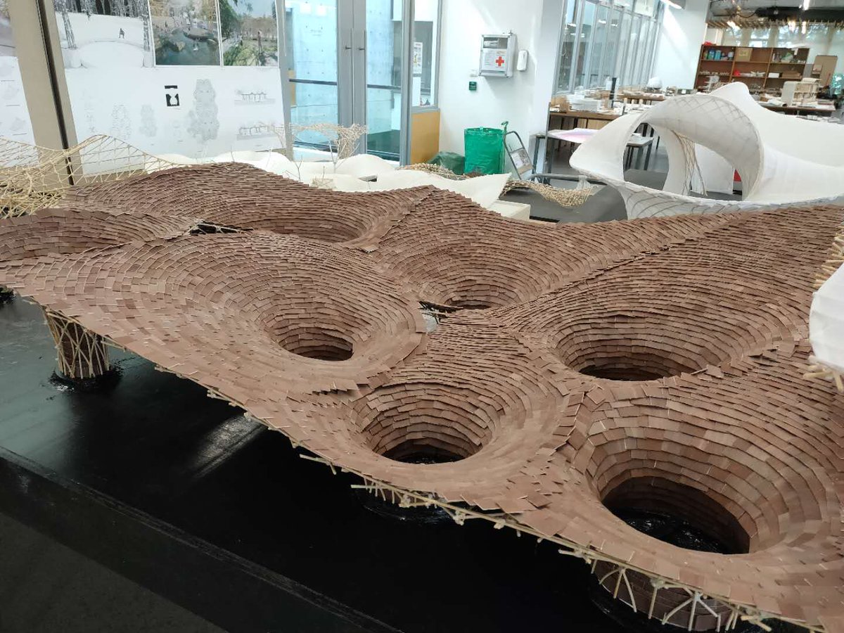 INBARofficial's tweet photo. The Chinese University of #HongKong's @CUHKofficial #Architecture department features an impressive display of #bamboo model structures to inspire students to use this versatile, abundant construction material 👏👏👏Amazing!💚#TheNextGeneration #EcoConstruction #BuildWithBamboo https://t.co/Z7HoAeBeEa