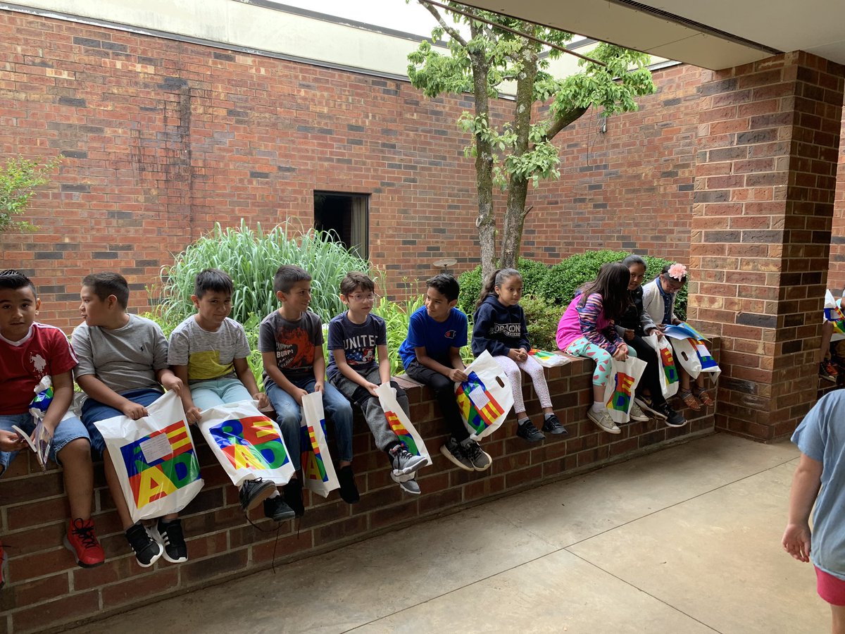 's tweet image. Myers summer school students are already enjoying their books from their first Reading Rocket stop of the summer! @hallcomediaspec #readingrocket #literacymatters