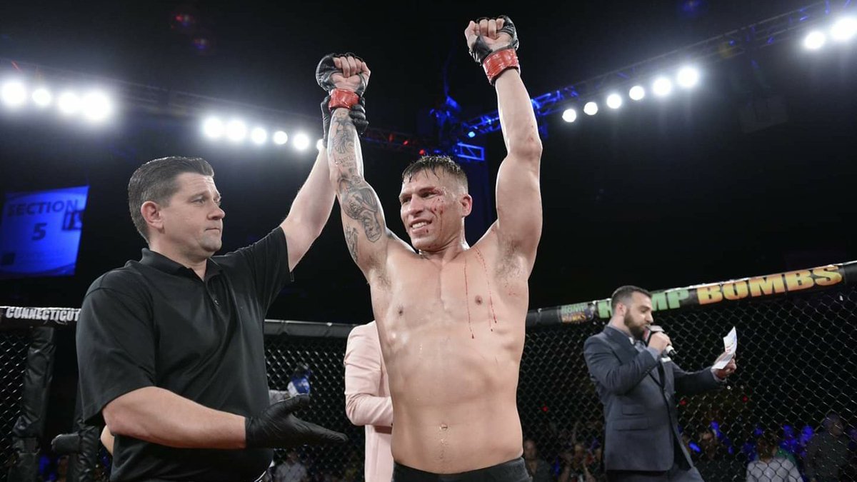 CESMMA's tweet photo. ๐ธ Champ @BruceBoyington & Dan Dubuque put on a fight for the ages in the main event of #CES56 in #Hartford, LIVE on @UFCFightPass!
After 5 back-and-forth rounds, Boyington retains his title & returns home to #Maine as #CESMMA's World Featherweight Champion! https://t.co/a9JjzM9nJk
