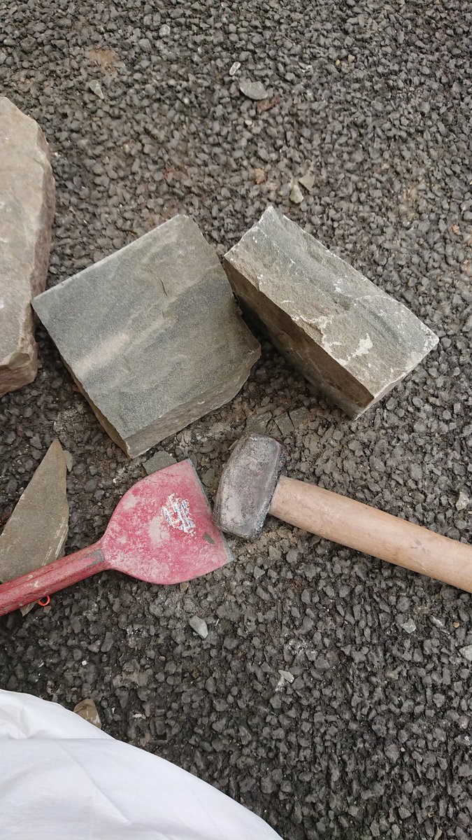 KarynMcGhee's tweet photo. Making my mason colleagues proud with dyking and splitting my first stone! Great instruction on their part, I even know how to improve it! #HESSummerSchool @HESEngineShed https://t.co/kyy6Ef0dTy