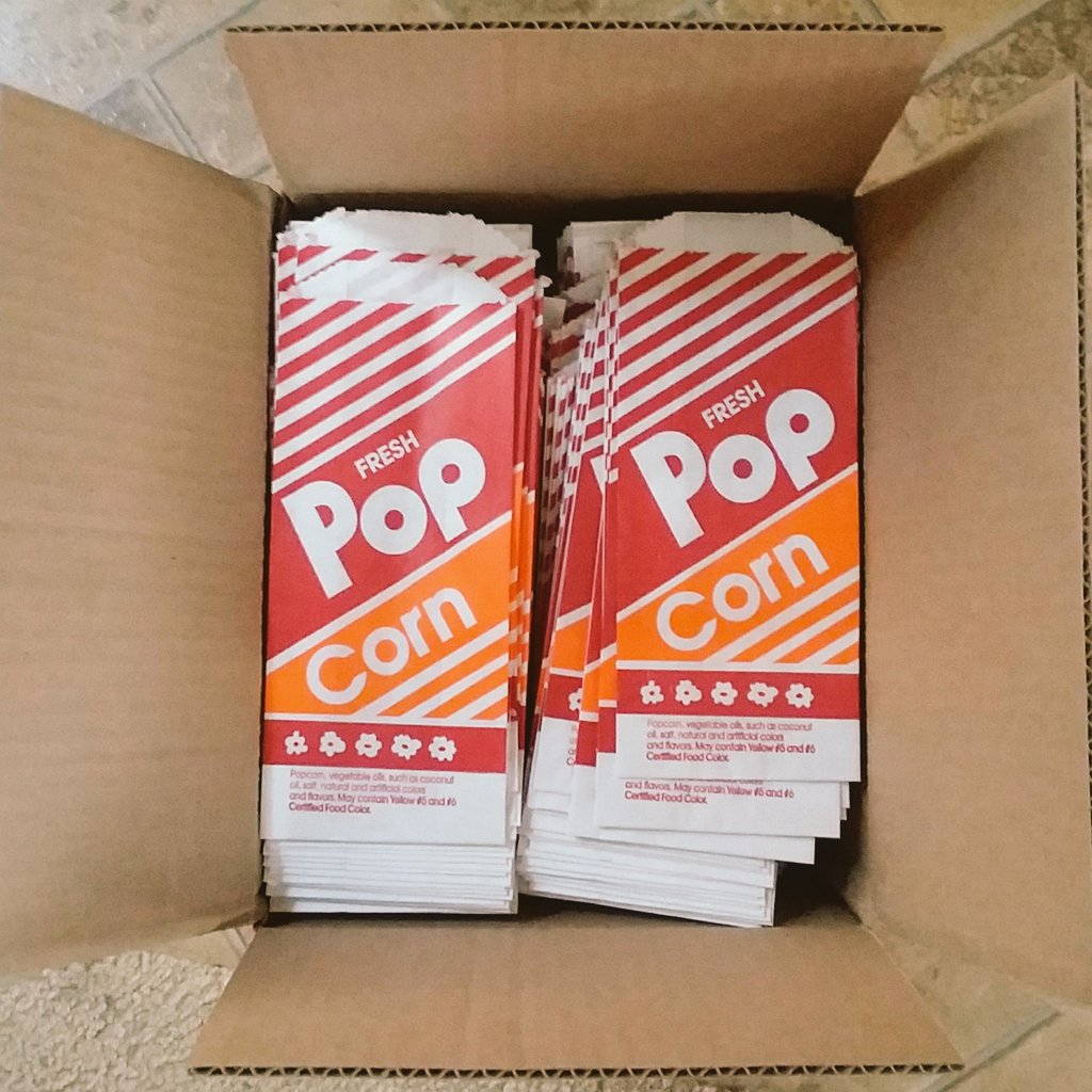 MVCarnival's tweet photo. Got a case of @GMPopcornFan popcorn bags today. I dig the retro design! https://t.co/Dwq7X8922q