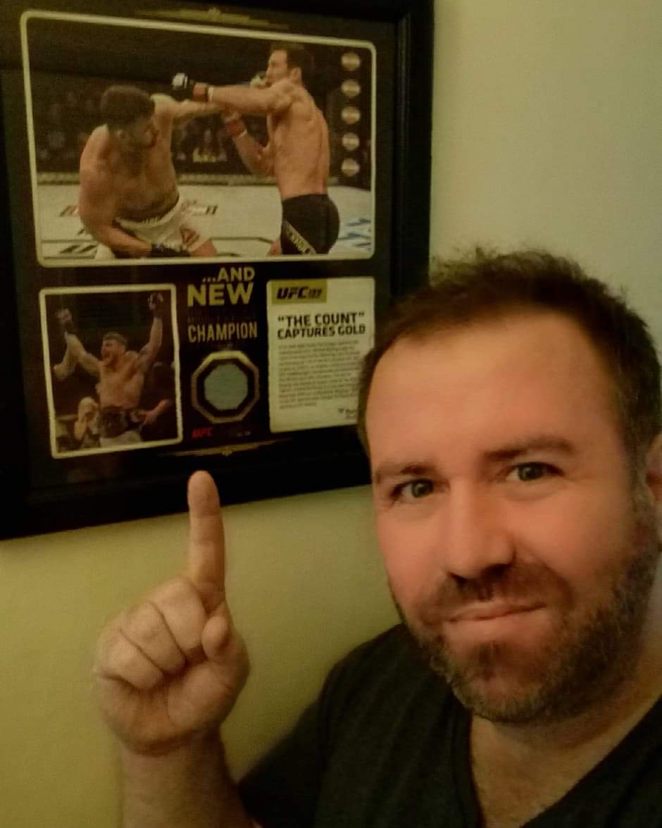 SpinninAlb's tweet photo. 3yrs ago today: #UFC199
Bisping becomes Champion
One of my fav sporting events.
@bisping a true legend π
I saved up my #UFCRewards points for this framed print w/piece of canvas from the event, one of my prized mma possessions. https://t.co/umsXQ3NKUn