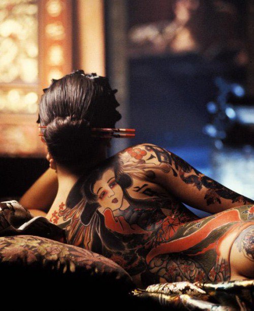 Irezumi, raditional Japanese tattoos, showing that you can appear roguish/sexy, with an indelible convinction/memory holding layer of the skin