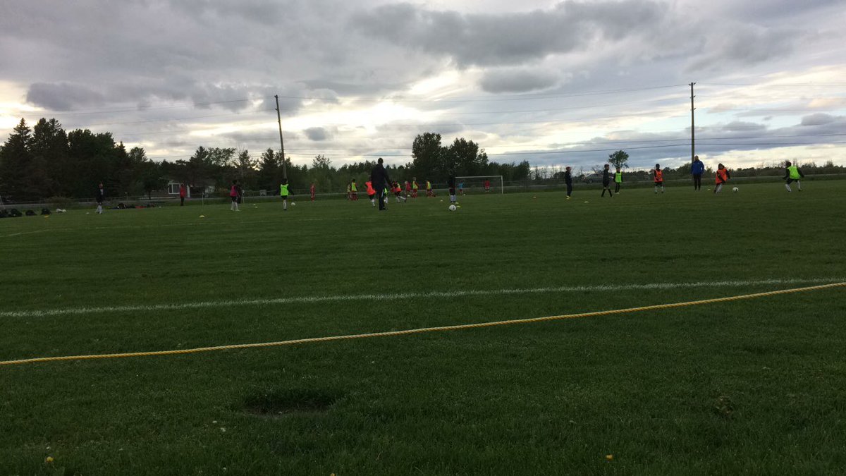 kiwicanada09's tweet photo. Sitting on a soccer field in June with an umbrella, wearing a winter parka, hat and a blanket and I’m still freezing. Something is very wrong #whereissummer #atleastitsnotsnowing #yet https://t.co/IHwIBi8x1x