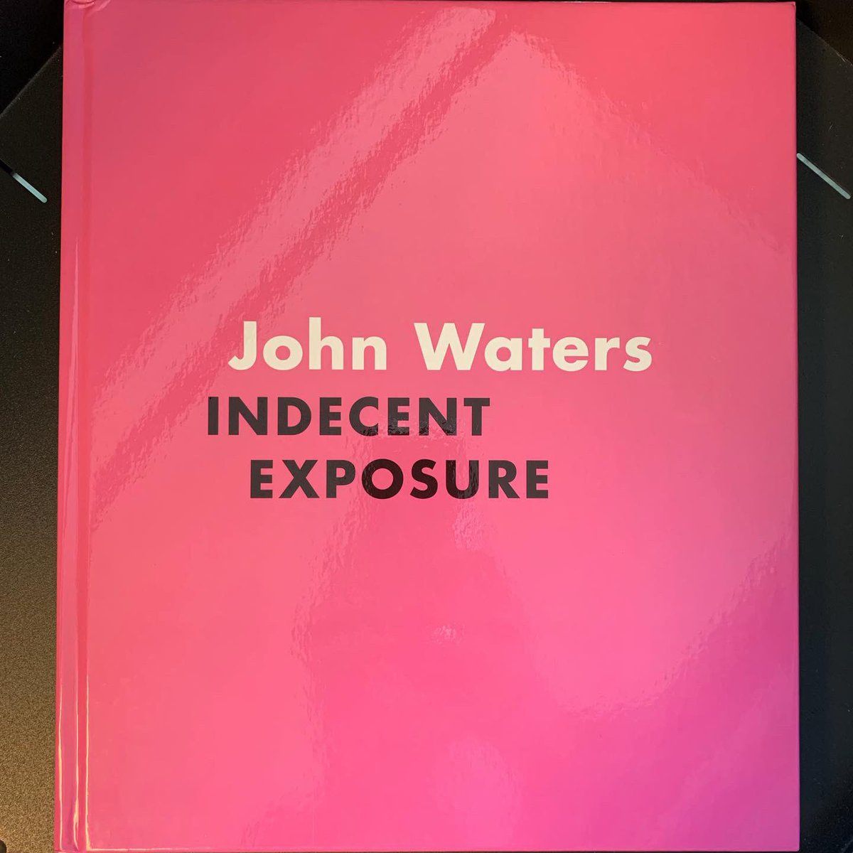ucpress's tweet photo. Happy #PrideMonth! The #brownpaperbag-referencing #dustjacket + pink #casebinding for “#JohnWaters: Indecent Exposure” could not possibly be more #Pride2019 appropriate. https://t.co/YPqjvu6JvL https://t.co/LeGYC41UuR
