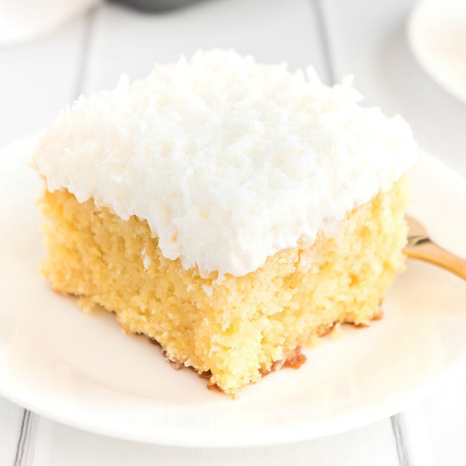 Our whole family is obsessed w/ this COCONUT POKE CAKE. It's moist &amp; delicious - the simple frosting will blow your socks off > spaceshipsandlaserbeams.com/coconut-poke-c… It's like a little bit of the islands at home! <a href="/PrincessCruises/">Princess Cruises</a> #OceanMedallion #comebacknew #sponsoredtravel #slbadventures