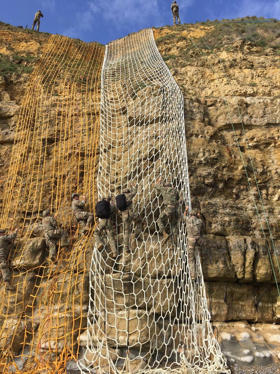 DeanKenKeen's tweet photo. Humbling morning at Pointe du Hoc with today’s Rangers making the climb and many others who paid their respects. We come to honor ‘The Boys of Pointe du Hoc’ who made the epic climb and assault 75 years ago. Rangers Lead The Way! https://t.co/6AM5ovn7ru