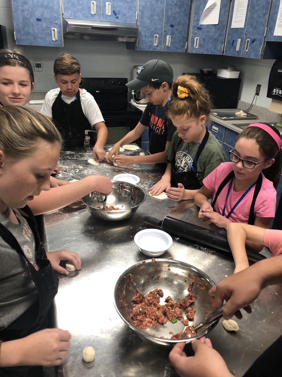 Chefinista's tweet photo. We started our day three of Culinary Camp with Homemade Pork Potstickers &amp; Dipping Sauce!! Thank you for Chef Tucker for your demo!! @MLCHS_Principal @MLCTitanNation @shelbycountysch #CulinaryCamp #SummerEnrichment #FreshDough #CultureExploration #CrabWontonsandStirFrytoCome https://t.co/ICojjMp2ah