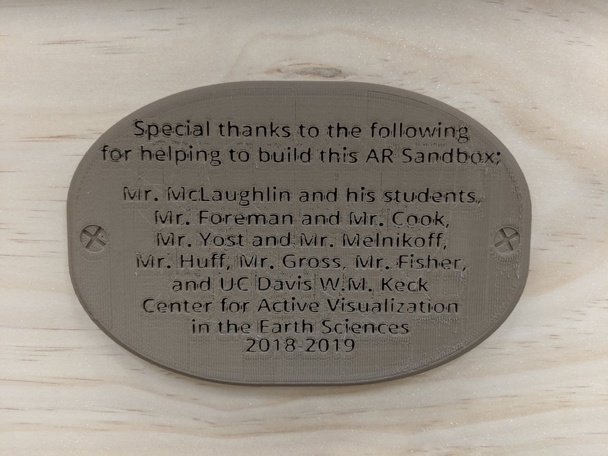 So how do you think the people who helped make our AR Sandbox come to be? You 3D print a plaque. It's a little hard to read but it's now found it's home on the front of the sandbox. <a href="/yostr03/">Rob Yost</a> <a href="/KenMelnikoff/">Ken Melnikoff</a> @sgross_jwhs @fcpsk12 #JWHSRocks #fcpsitc