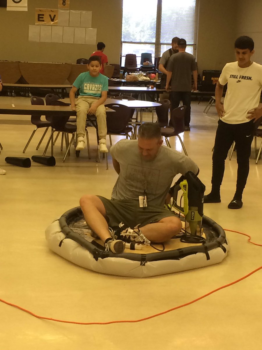 ttuSTEM's tweet photo. Mr. @mikeyjsize taking @cavazos_ms hovercraft for a drive! Finally someone let him get on! 🤪 @LubbockISD #fearlessleader https://t.co/pBswB2vs8O