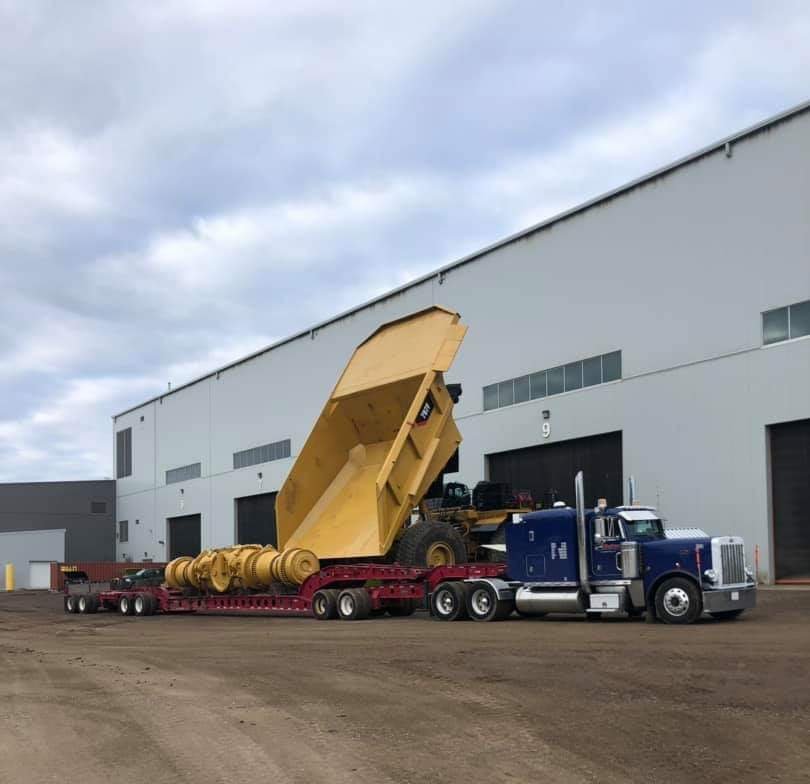 mullentrucking's tweet photo. You've probably noticed we haul a lot of #yellowiron - both #new and #used - we have the experience!
Doug Anderson here delivering a brand new #caterpillar #797F rear axle housing to @finningcanada with an assembled unit #flexing hard in the background. 💪#ourlifeisthehighway https://t.co/YsH2cvnjLD