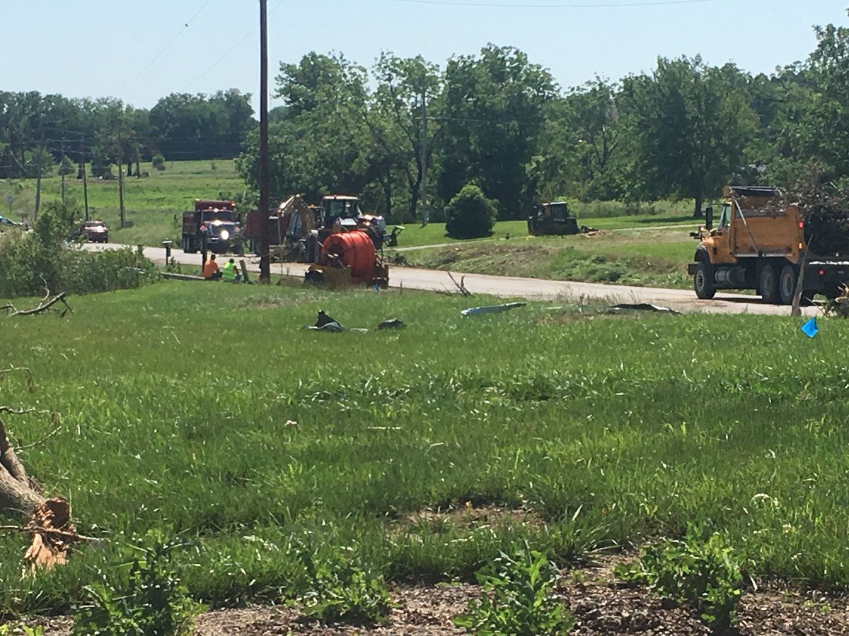 wibwCecelia's tweet photo. Crews work to rebuild homes and pick up debris left behind from last week’s devastating tornado just South of Lawrence. https://t.co/jXM0RyHG77