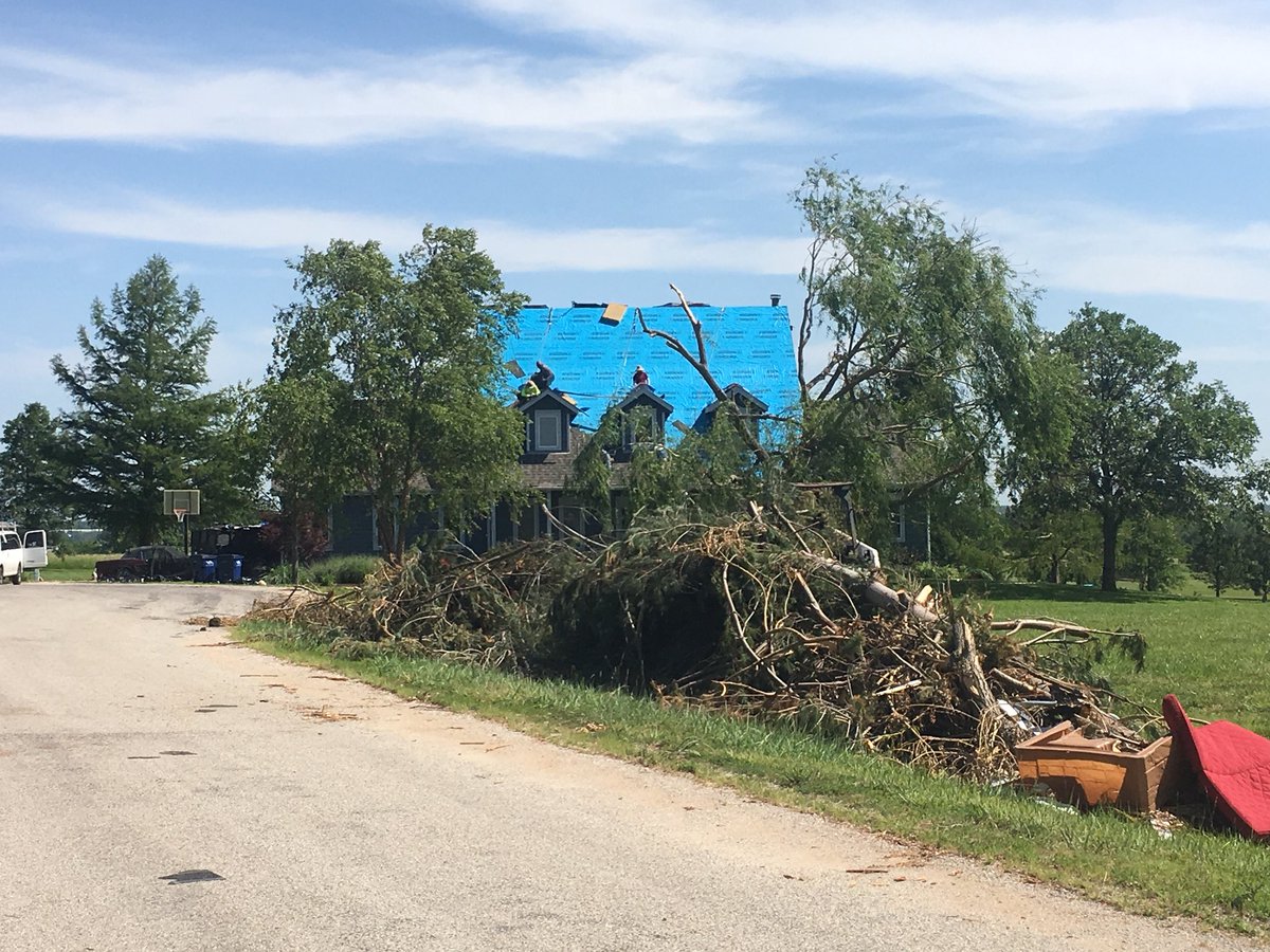 wibwCecelia's tweet photo. Crews work to rebuild homes and pick up debris left behind from last week’s devastating tornado just South of Lawrence. https://t.co/jXM0RyHG77