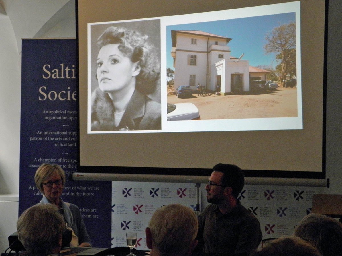 Great <a href="/MSparkSociety/">Muriel Spark Society</a> AGM with a talk from @Shane_Strachan on his book "Nevertheless," a series of short fictions funded through <a href="/MurielSpark100/">Muriel Spark 100</a>.  The picture behind him and <a href="/gewylie/">Gail Wylie</a> is of the Lady Rodwell Nursing Home in Bulawayo where Muriel Spark gave birth. <a href="/Sparkivist/">Sparkivist</a>