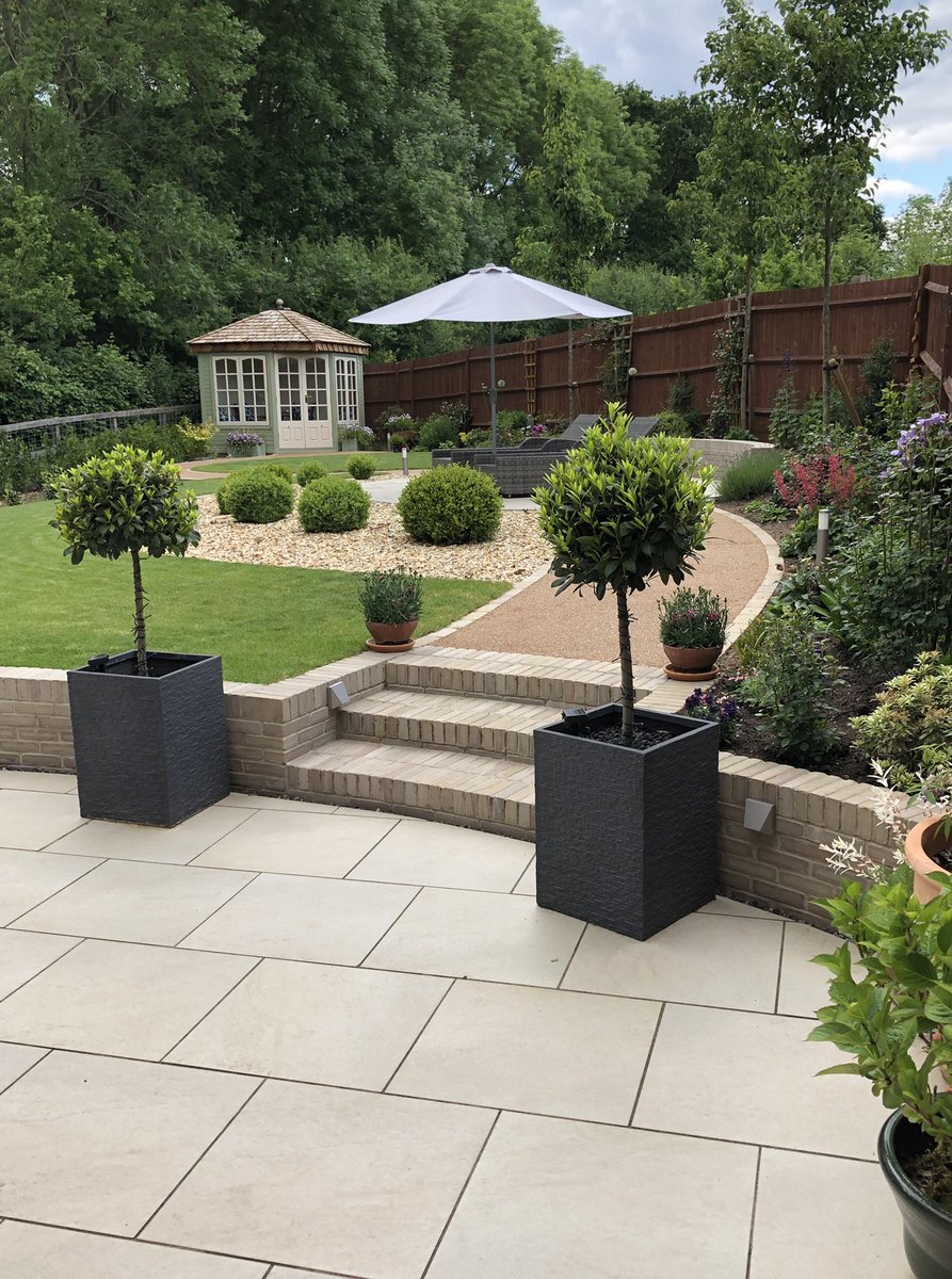 lands4living's tweet photo. #Landscapes4living #WeAreApl #bestbyfar Marshalls walling & setts. Resin pathways, porcelain terrace 50tonnes of soil, turf & feature trees 1yr on.. #inlite lights. #malvernbuildings client has part planted, so pleased it’s being enjoyed!!😎 https://t.co/CVA9zixi78