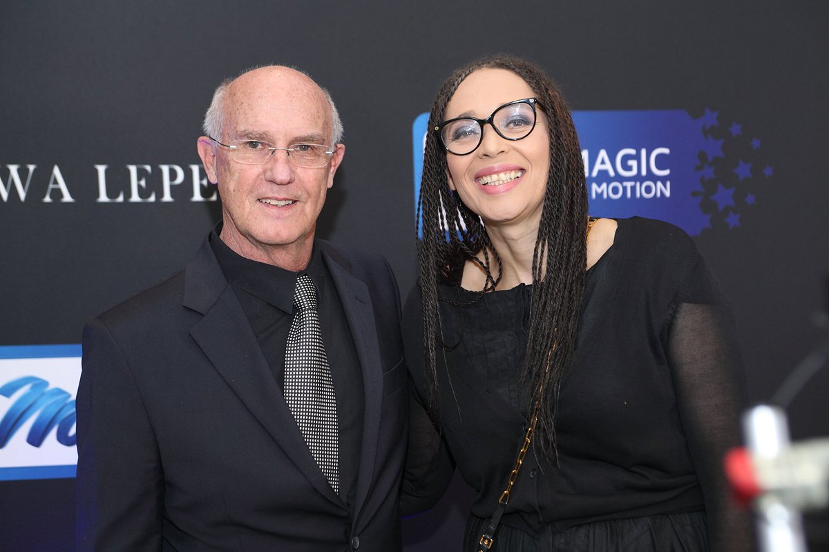 MultiChoiceGRP's tweet image. Bobby Heaney, Magic in Motion director is all smiles along side Yolisa Phahle as he arrives at the Magic In Motion graduates movie premiers.

#MGCxMNet
#MagicInMotion