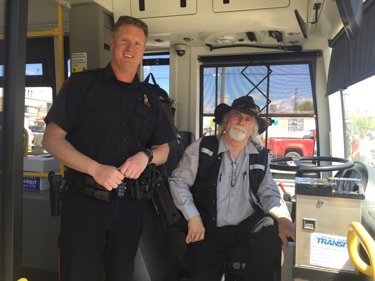 PAPoliceService's tweet photo. It's the @cityof_pa annual #TryTransitDay and @PAPOLICEca Sgt. Travis Willie stopped by to visit with people riding the bus. Sgt. Willie spoke with local driver Jim Seida, City Transportation Manager Keri Sapsford and others enjoying local transit. https://t.co/JEbWRBzjbv