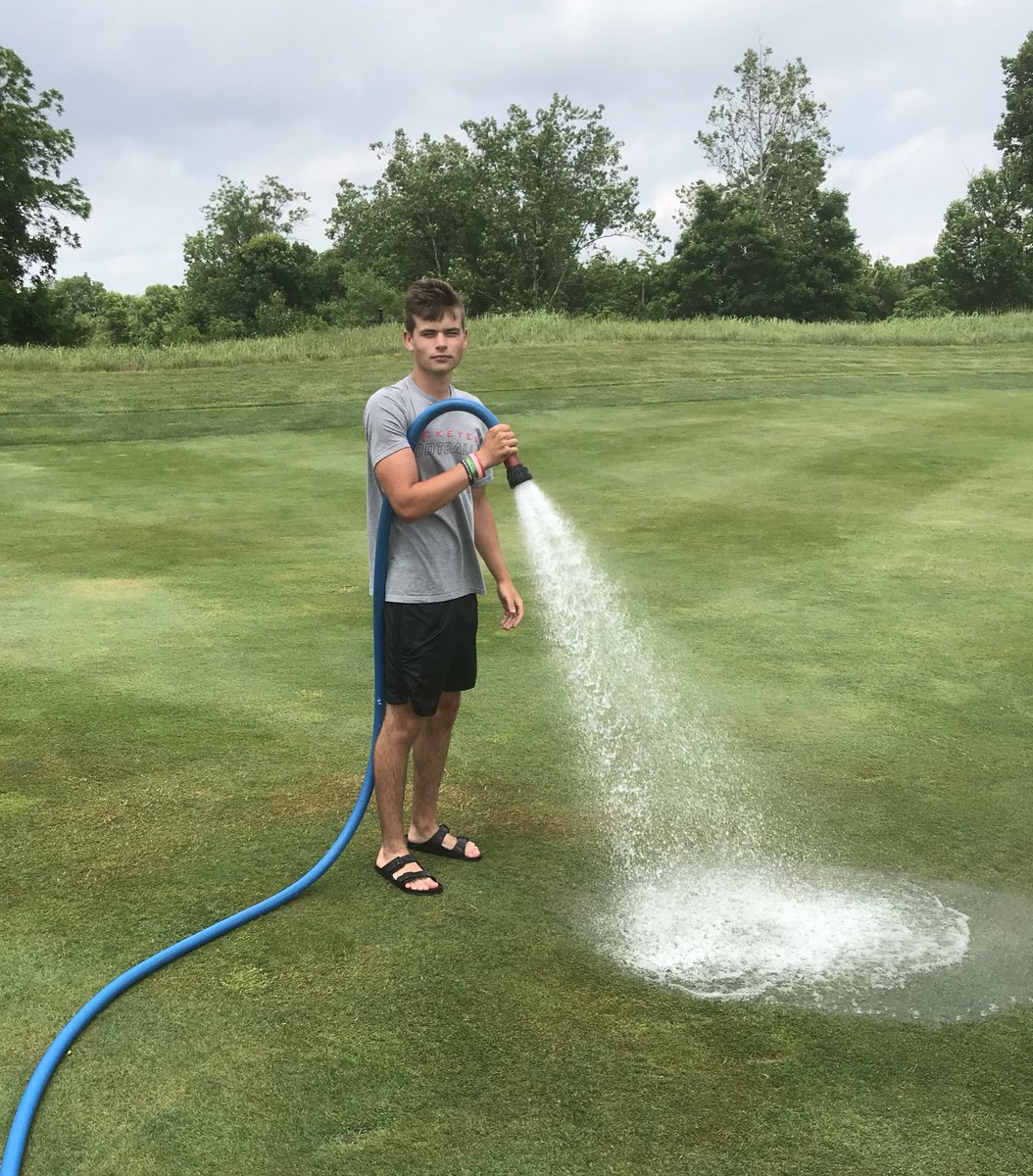 DaGroundscrew's tweet photo. You can always count on brother Aaron to keep these fairways nice and wet;) #RainMan #OperationRainCloud https://t.co/w7Z9coUxrF