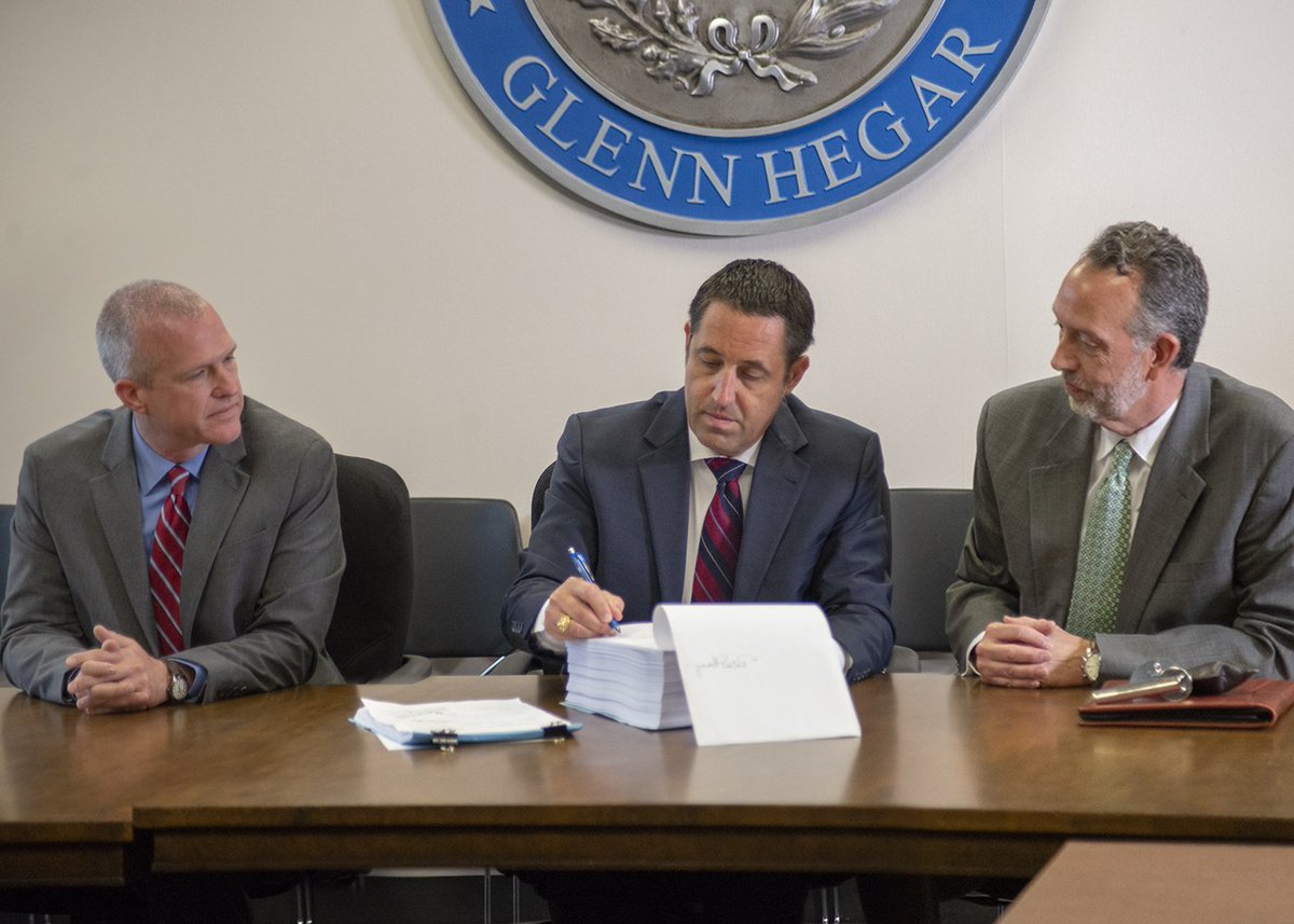 Comptroller Glenn Hegar, Associate Deputy Comptroller Phillip Ashley, and Director of Fiscal Management Rob Coleman