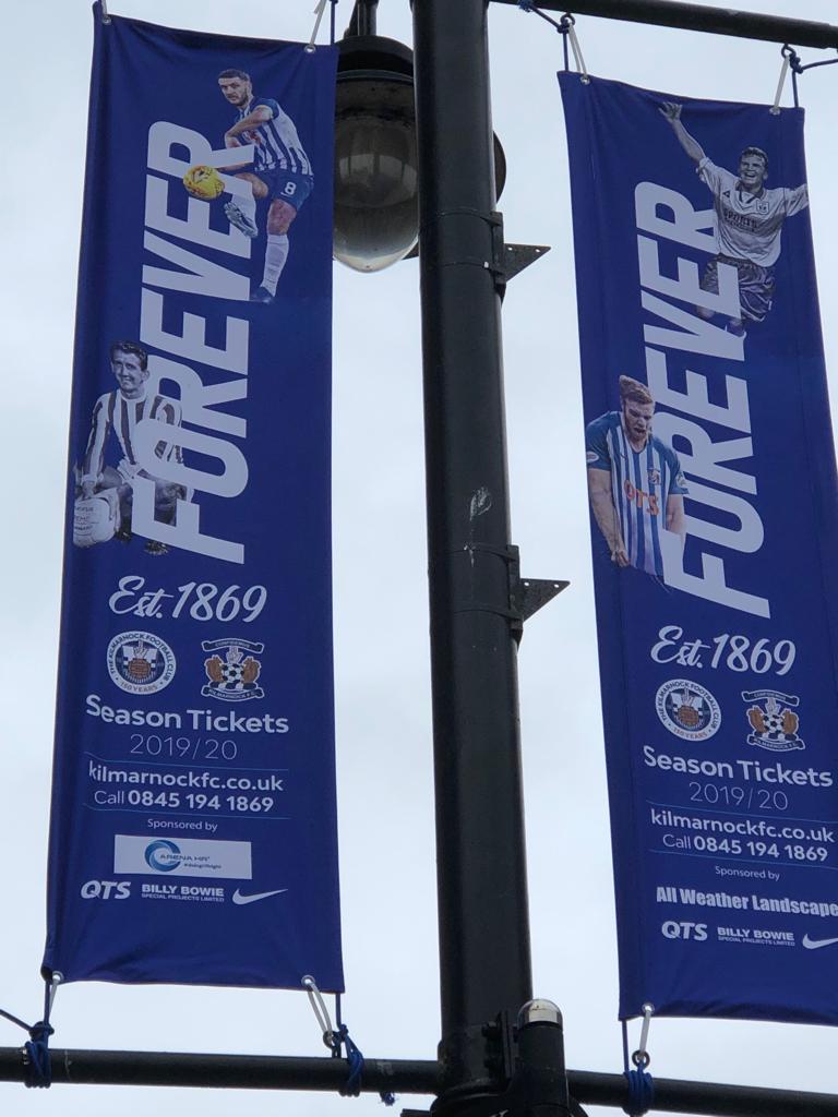 ArenaHR1's tweet photo. Thanks for this fabulous banner placed in John Dickie Street in Kilmarnock. Well chuffed to see Dicker &amp; Frank Beattie right next to our logo 💙⚽️
Season tickets on sale now it says #justsaying 
@KilmarnockFC @EastAyrshire @gary_dicker #doingHRright #WeAreKillie https://t.co/eAYgfEKpe7