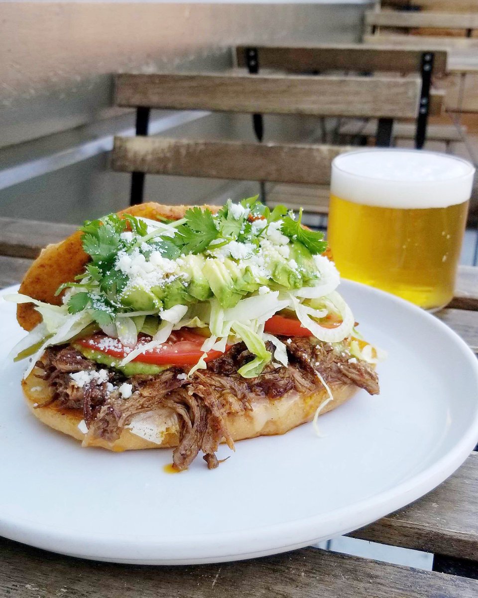 The Birria Torta! 💥 layers of short rib, salsa verde, cotija cheese, and avocado. Best paired with beer. 🍻