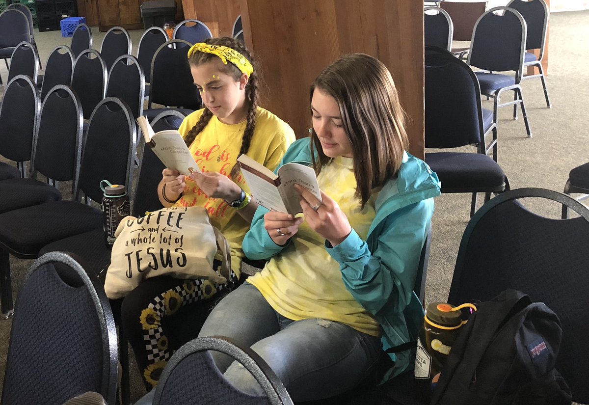 Sean_McDowell's tweet photo. Saw these two girls reading More Than A Carpenter at camp today! Who says kids don’t read anymore? https://t.co/JIP8Qlbvzq