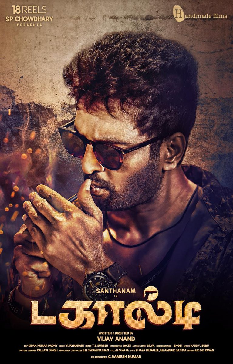 Here's #DagaaltyFirstLook 
#Dagaalty starring <a href="/iamsanthanam/">Santhanam</a> <a href="/SenRittika/">Rittika Sen</a> <a href="/iyogibabu/">Yogi Babu</a> 
Directed by <a href="/vijayanans/">Vijay Anand</a>  
Produced by #18Reels <a href="/SPChowdhary3/">SP Chowthari</a> 
Music by <a href="/VijayNarain/">Vijaynarain</a> 

#stayunlimited #unlimitedmovies #friendofcinema #padampolama