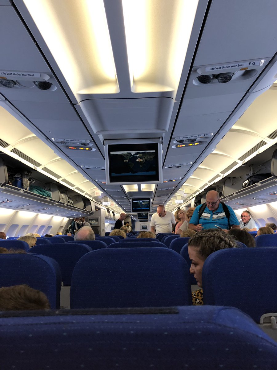 jaclynn1982's tweet photo. @ThomasCookUK absolute disgrace, 2 days notice to tell us of plane change. The only TVs on the flight. Travelling with 6 kids! To use own devices but not charging point on a 9 hour flight! Also told it was Thomas cook crew, no Thomas cook crew in sight! £15 compensation. Joke https://t.co/s7OuR4yzBT