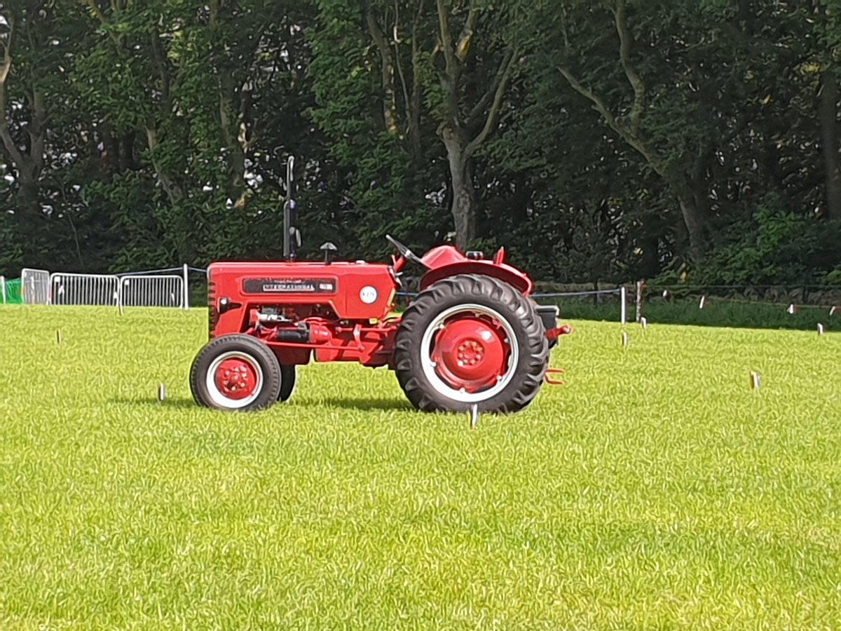First tractor arrived and looking resplendent in the afternoon sunshine up on the field!