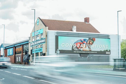 OfficialWIGGINS's tweet photo. Not every day you are on a billboard in your home town, thank you @LeColUK for marking @Tompid’s big win at the weekend #WIGGINS #development #nextgen 📷 @CyclingImages https://t.co/9ZqHayOz5s