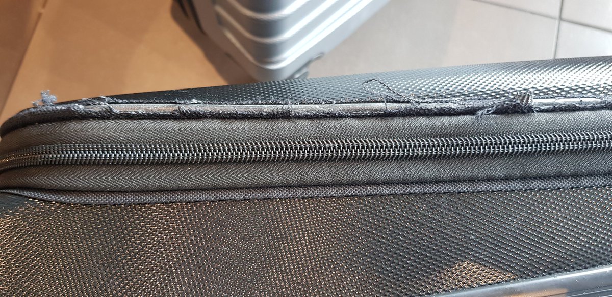 HelenBarnham's tweet photo. @flybe my approved hand luggage which fit into your size guide has been badly damaged by the metal container. How do you plan to compensate me. The suitcase is practically new. https://t.co/1kxxaNN4sm