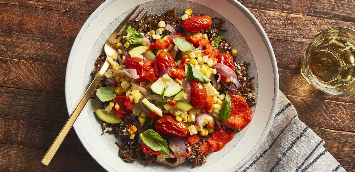 This bowl is brimming with some of our favorite things, like nutty wild rice and zucchini, corn, and tomatoes. bit.ly/2ESJ9uk