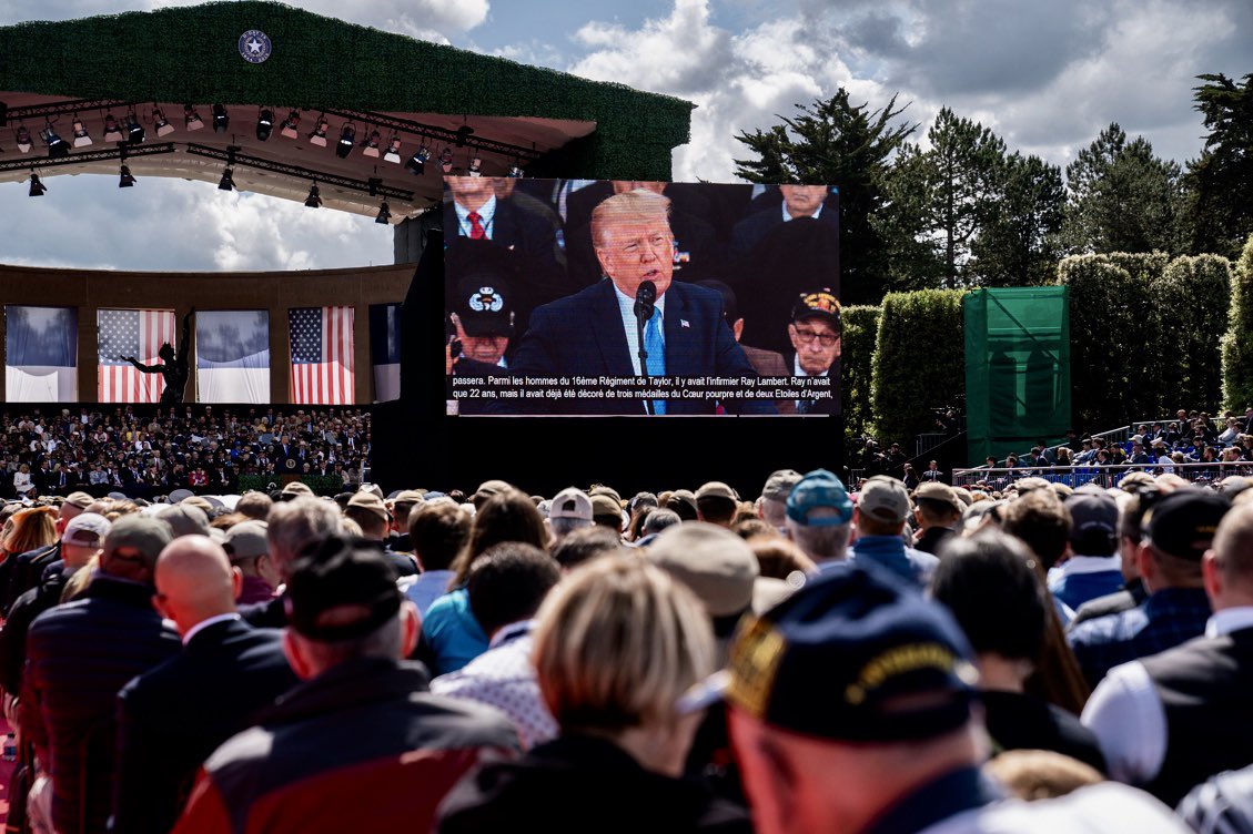 realDonaldTrump's tweet photo. To the men who sit behind me, and to the boys who rest in the field before me: your example will never grow old. Your legend will never tire, and your spirit - brave, unyielding, and true - will NEVER DIE! #DDay75thAnniversary https://t.co/5qwQjkvHdl
