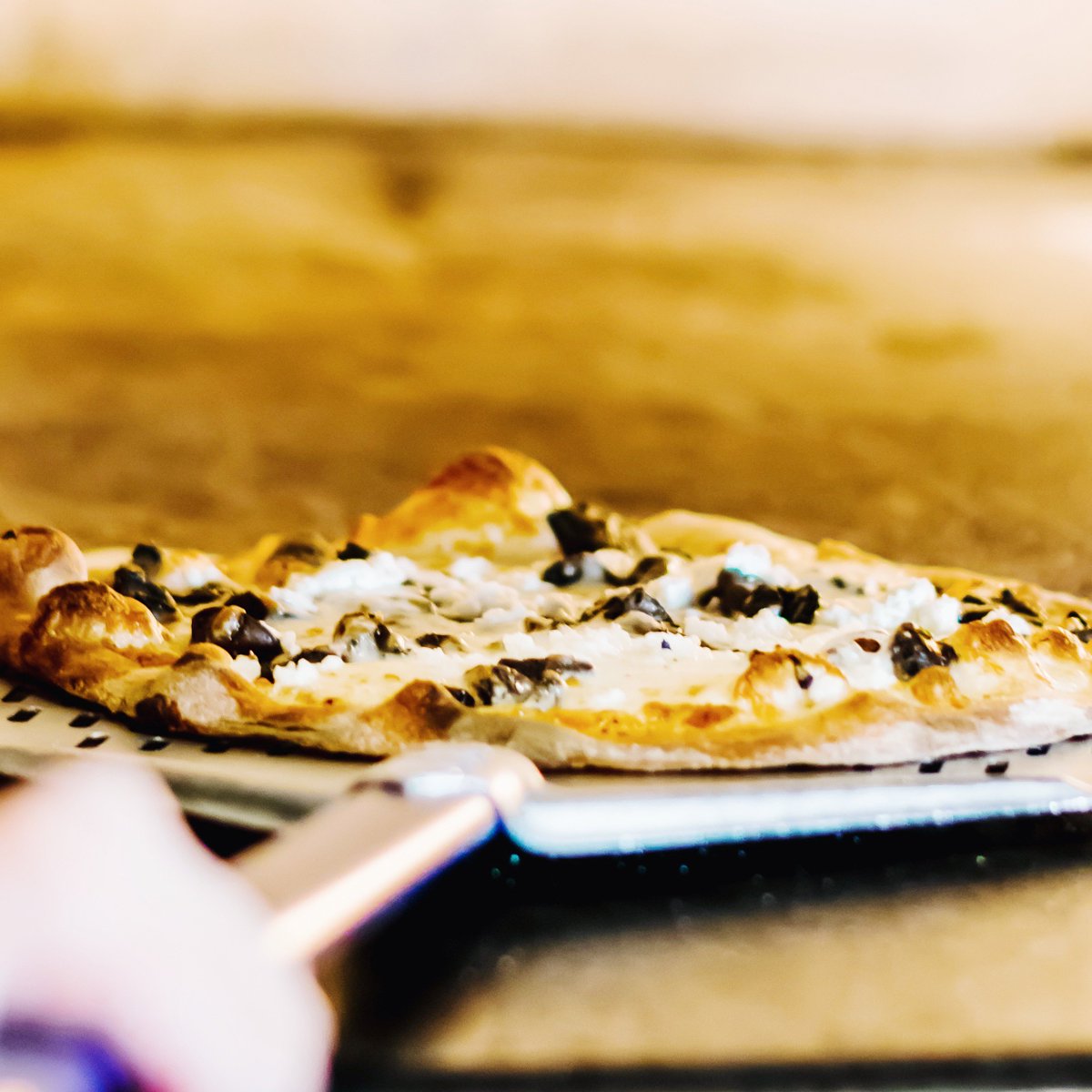 There's nothing better than seeing your pizza coming out of the oven